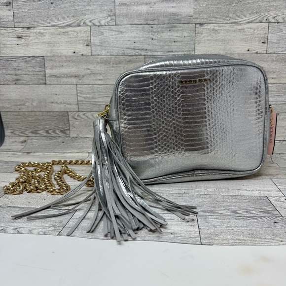 Victoria's Secret Handbags - NWT- Victoria’s Secret Silver Snake Skin Crossbody Bag with Tassel & Gold Chain